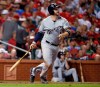 FILE - In this Sept. 29, 2017, file photo, Milwaukee Brewers' Stephen Vogt watches his solo home run during the fourth inning of a baseball game against the St. Louis Cardinals, in St. Louis. Free agent catcher Stephen Vogt is returning to the Bay Area, agreeing to a minor league contract with the San Francisco Giants. Vogt shared the news in a text message Monday, Feb. 11, 2019, when he was en route to the club‚Äôs spring training complex in Scottsdale, Arizona, for Wednesday‚Äôs pitchers and catchers reporting day. (AP Photo/Jeff Roberson, File)