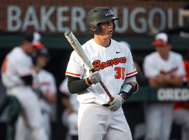 FILE - In this April 26, 2019, file photo, Oregon State's Adley Rutschman gets set to bat against Washington State during an NCAA college baseball game in Corvallis, Ore. The Orioles selected Rutschman as the No. 1 overall pick in the Major League Baseball draft. The Orioles hope Rutschman will accelerate their rebuild toward respectability. (AP Photo/Chris Pietsch, File)