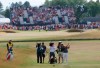 FILE - In this July 22, 2018, file photo, Francesco Molinari of Italy plays a shot on the 18th fairway during the final round for the 147th British Open Golf championships in Carnoustie, Scotland. His lob wedge clinched the Open and was among the defining shots of the year. (AP Photo/Martin Cleaver, File)