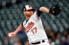 FILE - In this Sept. 11, 2018, file photo, Baltimore Orioles pitcher Alex Cobb throws against the Oakland Athletics in the first inning of a baseball game, in Baltimore. Cobb is among a handful of veterans sure to make the 25-man roster. (AP Photo/Gail Burton, File)