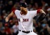 FILE - In this Oct. 23, 2018, file photo, Boston Red Sox's Craig Kimbrel throws during the ninth inning of Game 1 of the World Series baseball game against the Los Angeles Dodgers in Boston. Cubs manager Joe Maddon is projecting how to use Craig Kimbrel, even before Chicago announces a deal with the free agent closer. Maddon thinks the 31-year-old right-hander might be ready to pitch in about three weeks. . (AP Photo/Matt Slocum, File)