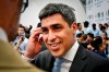 FILE - In this May 22, 2013, file photo, former U.S. national team soccer captain Claudio Reyna reacts during an interview in New York. Reyna, a constant in the repeatedly changing technical staff at Major League Soccer's New York City team, quit to take the same role with the Austin expansion team that starts play in 2021. (AP Photo/Bebeto Matthews, File)
