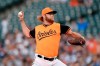 FILE - In this Aug. 25, 2018, file photo, Baltimore Orioles starting pitcher Andrew Cashner delivers a pitch during the first inning of the second baseball game of a doubleheader against the New York Yankees, in Baltimore. Cashner is one of a handful of veterans sure to make the 25-man roster. (AP Photo/Nick Wass, File)