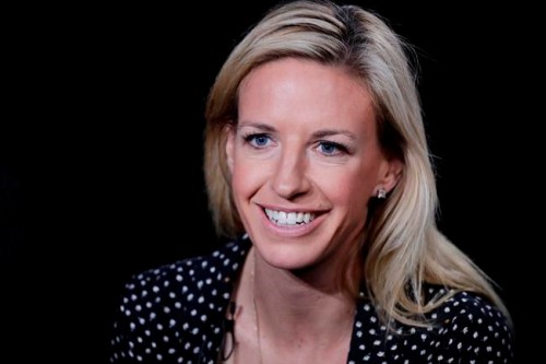FILE - In this May 30, 2018, file photo, Aly Wagner talks during an interview in New York. JP Dellacamera and former U.S. midfielder Aly Wagner will be Fox's lead broadcast team for the Women's World Cup in France. The announcement comes 100 days before the tournament opens June 7 with a matchup of France and South Korea. Fox said Wednesday, Feb. 27, 2019, that 22 matches will be broadcast on the main Fox network, 27 on FS1 and three on FS2. (AP Photo/Mark Lennihan, File)
