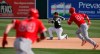 FILE - In this March 4, 2019, file photo, Chicago White Sox second baseman Nick Madrigal (92) makes the throw to second base in time to throw out Los Angeles Angels' Jack Kruger (98) for the first half of a double play on a ball hit by Brandon March (89) in the eighth inning of a spring training baseball game, in Glendale, Ariz. The Giants' Joey Bart already looks like a big leaguer in his first camp. The same with Nick Madrigal of the White Sox and the four college pitchers the Royals chose within the first 40 selections last season. Perhaps they are the beginning of a trend toward quick-to-the-bigs draft picks _ guys who can provide rather immediate help not unlike the NFL or the NBA. (AP Photo/Sue Ogrocki, File)