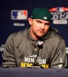 FILE - In this Oct. 2, 2018, file photo, Oakland Athletics relief pitcher Liam Hendriks, of Australia, speaks during a news conference before their upcoming American League wildcard baseball game against the New York Yankees, in New York. Manager Bob Melvin and the Oakland Athletics have put their faith in Hendriks to finish games as a reliable ninth-inning option night after night. Never one to stick with traditional methods and frustrated with himself last year in Triple-A, Hendriks searched for a way to transform his mental approach. This good-natured Aussie was in need of an attitude shift. And an energy healer named Rubi Rios sure provided a nice assist in his transformation process. (AP Photo/Frank Franklin II, File)