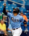 FILE - In this Sept. 9, 2018, file photo, Tampa Bay Rays' Carlos Gomez celebrates his home run off Baltimore Orioles starting pitcher Jimmy Yacabonis during the sixth inning of a baseball game, in St. Petersburg, Fla. Carlos Gomez is back with the Mets, 3 1/2 years after a trade that would have sent him from Milwaukee to New York fell through. (AP Photo/Chris O'Meara, File)