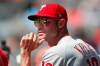 FILE - In this Sept. 19, 2019, file photo, Philadelphia Phillies manager Gabe Kapler (19) watches from the dugout during a baseball game against the Atlanta Braves, in Atlanta. The Phillies fired Kapler Thursday, Oct. 10, 2019.(AP Photo/John Bazemore, File)