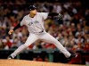 FILE - In this Oct. 6, 2018, file photo, New York Yankees relief pitcher Dellin Betances throws against the Boston Red Sox during the sixth inning of Game 2 of a baseball American League Division Series in Boston. Betances’ season appears over after just eight pitches. The Yankees say the reliever partially tore the Achilles tendon in his left foot when he hopped on the mound after striking out Brandon Drury, the second and final batter he faced in his season debut at Toronto. (AP Photo/Charles Krupa, File)