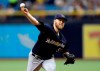 FILE - In this Sunday, Aug. 6, 2017 file photo, Milwaukee Brewers' Jimmy Nelson pitches to the Tampa Bay Rays during the first inning of an interleague baseball game in St. Petersburg, Fla. Milwaukee Brewers right-hander Jimmy Nelson is bracing himself for an emotional return Wednesday, June 5, 2019 against the Miami Marlins. Nelson hasn’t pitched in a major league game since he injured his pitching shoulder diving back to first after rounding the base on a single in September 2017. (AP Photo/Chris O'Meara, File)