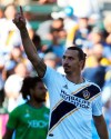 FILE - In this Sept. 23, 2018, file photo, LA Galaxy forward Zlatan Ibrahimovic (9) celebrates his goal against the Seattle Sounders in the first half of an MLS soccer match, in Carson, Calif. Zlatan Ibrahimovic is returning to the Los Angeles Galaxy. A person with knowledge of the deal confirms the 37-year-old striker will play next season for the Galaxy. The person spoke on the condition of anonymity because the team had not yet formally announced it. (AP Photo/Reed Saxon, File)
