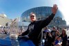 FILE - In this Nov. 3, 2015, file photo, Kansas City Royals manager Ned Yost waves to the crowd during a parade celebrating the Royals winning baseball's World Series, in Kansas City, Mo. Yost did something that few thought possible when he took over the Kansas City Royals in 2010: He not only built the organization into a winner but delivered the long-suffering organization its first World Series title in three decades. Now, he's leaving the next rebuilding job to someone else. Yost announced Monday, Sept. 23, 2019, that he will be retiring at the end of the season, ending a nine-year tenure that included two American League pennants and that dramatic 2015 championship. (AP Photo/Charlie Riedel, File)