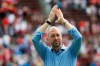 FILE - In this June 9, 2019, file photo, United States head coach Gregg Berhalter responds to fans after an international friendly soccer match against the Venezuela, in Cincinnati. The sporting director of the U.S. Soccer Federation says Gregg Berhalter's job is safe as men's national team coach despite some disappointing results. 
