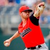 FILE - In this Sunday, Aug. 26, 2018 file photo, Cleveland Indians starting pitcher Shane Bieber throws during the first inning of a baseball game against the Kansas City Royals in Kansas City, Mo. A fourth-round pick in 2016, Bieber rocketed through the Indians‚Äô farm system and became one of the team‚Äôs steadiest starters in just his third pro season. After beginning 2018 at Double-A Akron, he was promoted to Triple-A Columbus and wound up making 19 starts for the Indians, going 11-5 with a 4.55 ERA. (AP Photo/Charlie Riedel, File)