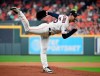 FILE - In this Oct. 5, 2018, file photo, Houston Astros starting pitcher Justin Verlander delivers a pitch against theCleveland Indians during the first inning in Game 1 of an American League Division Series baseball game, in Houston. The Astros have plenty of reasons to be confident with a big chunk of last year's squad which won a franchise-record 103 games. That group is led by a bevy of stars including 2017 AL MVP Jose Altuve, shortstop Carlos Correa, third baseman Alex Bregman, 2017 World Series MVP George Springer and starters Verlander and Gerrit Cole, who combined for 31 wins and 566 strikeouts in 2018. (AP Photo/Eric Christian Smith, File)