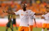 FILE - In this Saturday, May 16, 2015 file photo, Houston Dynamo midfielder DaMarcus Beasley gestures to the linesman for a call in the first half of an MLS soccer game against the Portland Timbers in Houston. DaMarcus Beasley says he will retire at the end of the Houston Dynamo season after 20 years in professional soccer. Beasley, a midfielder and left back, is the only American who has played in four World Cups and the only American to appear in a European Champions League semifinal. He turns 37 on May 24, 2019. (AP Photo/Bob Levey, File)