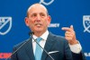 FILE - In this May 29, 2018, file photo, Major League Soccer commissioner Don Garber speaks during an event to announce the addition of FC Cincinnati as an expansion team, in Cincinnati. Major League Soccer is shortening its season by a month, going to single-elimination playoffs and scheduling its 2019 MLS Cup final for Nov. 10 in its earliest finish since 2002. The league announced the change Monday, Dec. 17, 2018, and will have an all-knockout postseason in place of a two-leg format for the conference semifinals and finals. (AP Photo/John Minchillo, File)