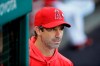 FILE - In this Aug. 15, 2019, file photo, Los Angeles Angels manager Brad Ausmus watches from the dugout during the team's baseball game against the Chicago White Sox, in Anaheim, Calif. Manager Brad Ausmus has been fired by the Los Angeles Angels after just one season in charge. Angels general manager Billy Eppler announced the decision to move on swiftly from Ausmus on Monday, Sept. 30, 2019, a day after they finished 72-90 for the franchise's worst record since 1999. (AP Photo/Marcio Jose Sanchez, File)
