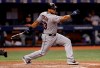 FILE - In this Sept. 10, 2018, file photo, Cleveland Indians' Melky Cabrera singles off Tampa Bay Rays pitcher Adam Kolarek during the sixth inning of a baseball game, in St. Petersburg, Fla. The Pittsburgh Pirates announced their minor league contract with outfielder Melky Cabrera, who will report to major league spring training. (AP Photo/Chris O'Meara, File)