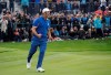 FILE - In this Sept. 30, 2018, file photo, Europe's Jon Rahm celebrates after beating Tiger Woods in a singles match on the final day of the 42nd Ryder Cup at Le Golf National in Saint-Quentin-en-Yvelines, outside Paris, France. Rahm says it was the best moment of his golf career.(AP Photo/Matt Dunham, File)