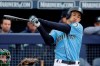 FILE - In this Friday, Feb. 22, 2019 file photo, Seattle Mariners' Ichiro Suzuki bats during the third inning of a spring training baseball game against the Oakland Athletics in Peoria, Ariz. Jerry Dipoto's first introduction to the world of Ichiro Suzuki was only a small taste compared to what the Seattle Mariners are about to experience when they open the season in Tokyo with a pair of games against the Oakland Athletics. The most decorated player ever to export his talents from Japan to the major leagues is returning home for what could be a farewell to his Hall of Fame career on both sides of the Pacific. His teammates can't wait. (AP Photo/Charlie Riedel, File)
