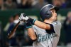 FILE - In this March 20, 2019, file photo, Seattle Mariners' Ichiro Suzuki pops out in the third inning of Game 1 of the Major League Baseball opening series against the Oakland Athletics at Tokyo Dome in Tokyo. Suzuki has rejoined the Mariners as a special assistant to the chairman and will work as an instructor with both the major league club and some of the organization‚Äôs players in the minors. (AP Photo/Koji Sasahara, File)