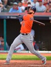FILE - In this Oct. 8, 2018, file photo, Houston Astros' Marwin Gonzalez hits a two-run double in the seventh inning during Game 3 of a baseball American League Division Series against the Cleveland Indians, in Cleveland. A person familiar with the negotiations tells The Associated Press that versatile Marwin Gonzalez and the Minnesota Twins have agreed to a $21 million, two-year contract. The person spoke on condition of anonymity Friday, Feb. 22, 2019, because the agreement is subject to a successful physical. (AP Photo/Phil Long, File)
