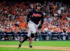 FILE - In this Oct. 6, 2018, file photo, Cleveland Indians' Francisco Lindor celebrates as he round the bases after hitting a solo home run against the Houston Astros during the third inning of Game 2 of a baseball American League Division Series, in Houston. The Indians All-Star shortstop will likely miss the start of the season with a strained right calf. Lindor, one of baseball's best all-around players, sustained the injury recently while working out in Orlando, Florida. He was checked Wednesday, Feb. 6, 2019, at the Cleveland Clinic by Dr. Mark Schickendantz, who confirmed a moderate sprain. (AP Photo/David J. Phillip, File)