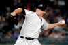 FILE - In this July 26, 2018, file photo, New York Yankees' Zach Britton delivers a pitch during the eighth inning of a baseball game against the Kansas City Royals, in New York. Zack Britton will be a different pitcher for the New York Yankees this year _ at least in name. Known throughout his baseball career as Zach, the 31-year-old reliever said Thursday, Feb. 7, 2019, going forward his name should be spelled Zack.(AP Photo/Frank Franklin II, File)