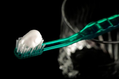 FILE - This Wednesday, Oct. 28, 2009 file photo shows toothpaste on a toothbrush in Marysville, Pa. A report released by the Centers for Disease Control and Prevention on Thursday, Jan. 31, 2019, says too many young kids are using too much toothpaste, increasing their risk of streaky or splotchy teeth when they get older. (AP Photo/Carolyn Kaster, File)