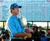 FILE - In this June 20, 2004, file photo, Retief Goosen, of South Africa, holds the U.S. Open Championship trophy at Shinnecock Hills Golf Club in Southampton, N.Y. Goosen was inducted into the World Golf Hall of Fame, Monday, June 10, 2019. (AP Photo/Charles Krupa, File)