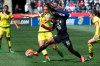 FILE- In this April 10, 2016, file photo, Colombia's Isabella Echeverri (5) battles for the ball against United States' Crystal Dunn (16) during the first half of an international friendly soccer match in Chester, Pa. Players in Latin America face obvious economic and cultural challenges when it comes to soccer and sports overall. Emboldened by the actions of players in the United States, Australia and other countries, Echeverri and Melissa Ortiz started a high-profile social media campaign this year to bring to light to some of the issues faced by teammates on the Colombian women‚Äôs national team. (AP Photo/Chris Szagola, File)