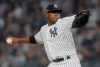 FILE - In this Oct. 8, 2018, file photo, New York Yankees starting pitcher Luis Severino delivers against the Boston Red Sox during the first inning of Game 3 of baseball's American League Division Series in New York. Severino is returning to New York to have more tests on his injured right shoulder. Yankees manager Aaron Boone says that Severino is not where he wants to be and they want to get him checked out to see why he is not progressing as expected. (AP Photo/Julie Jacobson, File)