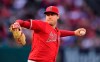 FILE - In this May 25, 2019, file photo, Los Angeles Angels starting pitcher Tyler Skaggs throws during the first inning of a baseball game against the Texas Rangers in Anaheim, Calif. The Angels say they do not know whether a longtime public relations official had been providing drugs to late pitcher Skaggs, as detailed in a report on ESPN's 