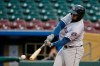 FILE - In this May 7, 2019, file photo, Round Rock designated hitter Yordan Alvarez, who leads the Triple-A league with 13 home runs, swings at a pitch in Papillion Neb. Home runs surged 58% at Triple-A this season following the switch this year to major league baseballs. A total of 5,752 homers were hit in the International and Pacific Coast Leagues, up from 3,652 in 2018. (AP Photo/Nati Harnik, File)