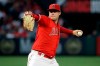 FILE - In this June 29, 2019, file photo, Los Angeles Angels starting pitcher Tyler Skaggs throws to the Oakland Athletics during a baseball game in Anaheim, Calif. Skaggs died from a toxic mix of the powerful painkillers fentanyl and oxycodone along with alcohol in an accidental overdose, a medical examiner in Texas ruled in a report released Friday, Aug. 30, 2019. (AP Photo/Marcio Jose Sanchez, File)