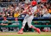 FILE - In this Aug. 3, 2018, file photo, St. Louis Cardinals' Dexter Fowler hits a single off Pittsburgh Pirates starting pitcher Chris Archer to drive in Tyler O'Neill during the fifth inning of a baseball game in Pittsburgh. Fowler is entering the third season of a five-year, $82 million contract. An All-Star with Chicago in 2016 when he posted a .393 on-base percentage to help lead the Cubs to their first World Series title in more than a century, Fowler scored 186 runs during a two-year stint with Chicago prior to joining St. Louis. (AP Photo/Keith Srakocic, File)