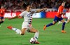 FILE - In this Aug. 31, 2018, file photo, United States' Alex Morgan shoots on goal against Chile during the first half of an international friendly soccer match, in Carson, Calif. Two goals away from reaching 100 for her career, forward Morgan is on the roster for the U.S. women's national team as it opens training camp ahead of the World Cup in France this summer. (AP Photo/Marcio Jose Sanchez, File)