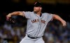 FILE - In this Sept. 6, 2019, file photo, San Francisco Giants relief pitcher Will Smith pitches during the ninth inning of a baseball game against the Los Angeles Dodgers in Los Angeles. The Atlanta Braves have bolstered their shaky bullpen by signing left-hander reliever Smith to a three-year, $40 million contract. The free agent deal announced Thursday, Nov. 14, 2019, includes a $13 million option for the 2023 season, with a $1 million buyout. (AP Photo/Kelvin Kuo, File)