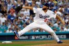 FILE - In this Oct. 28, 2018, file photo, Los Angeles Dodgers pitcher Clayton Kershaw winds up during the first inning in Game 5 of the World Series baseball game against the Boston Red Sox in Los Angeles. Kershaw has been shut down indefinitely because manager Dave Roberts says the Dodgers ace 