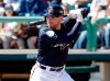 FILE - In this March 6, 2019, file photo, Atlanta Braves' Freddie Freeman bats against the Detroit Tigers in a spring baseball exhibition game in Kissimmee, Fla. Freeman believes the Phillies, Nationals and Mets had busy offseasons because they wanted to catch up to the 2018 NL East champion Braves. (AP Photo/John Raoux, File)
