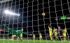 FILE - In this Dec. 2, 2018, file photo, Villarreal goalkeeper Sergio Asenjo, left, clears a ball during the Spanish La Liga soccer match between FC Barcelona and Villarreal at the Camp Nou stadium in Barcelona, Spain. Villarreal remained winless in 10 consecutive Spanish league matches after a 0-0 draw at 14th-place Valladolid on Friday, Feb. 8, 2019. (AP Photo/Manu Fernandez, File)