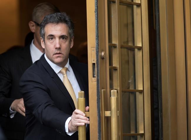 FILE - In this Aug. 21, 2018, file photo, Michael Cohen leaves Federal court, in New York. Cohen, President Trump's ex-lawyer, is making an court appearance before a federal judge in New York on Thursday, Nov. 29. (AP Photo/Mary Altaffer, File)