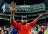FILE - In this Oct. 10, 2016, file photo, Boston Red Sox's David Ortiz waves from the field at Fenway Park after Game 3 of baseball's American League Division Series against the Cleveland Indians in Boston. Ortiz returned to Boston for medical care after being shot in a bar Sunday, June 9, 2019, in his native Dominican Republic. (AP Photo/Charles Krupa, File)