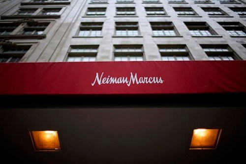 FILE - This March, 11, 2009, file photo, shows the Neiman Marcus store in Dallas. Neiman Marcus Group is getting serious about the fast growing secondhand luxury business. The Dallas-based luxury retailer said Wednesday, April 17, 2019, that it has acquired a minority stake in Fashionphile LLC, an online seller of preowned accessories. (AP Photo/Tom Pennington, File)