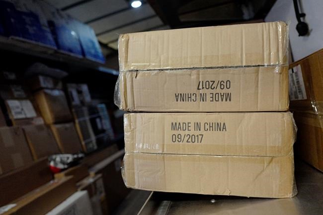 FILE- In this May 9, 2017, file photo packages labeled