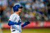 New York Mets' Jeff McNeil rounds first base after hitting a three-run home run, also scoring Amed Rosario and Zack Wheeler, during the third inning of a baseball game against the Pittsburgh Pirates, Friday, July 26, 2019, in New York. (AP Photo/Corey Sipkin)