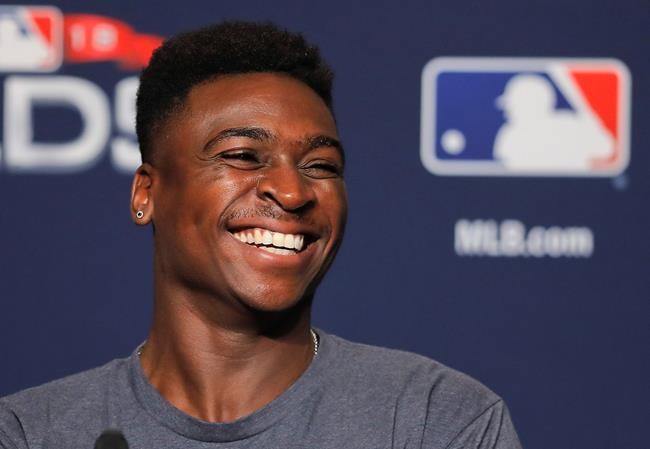 FILE - In this Oct. 7, 2018, file photo, New York Yankees shortstop Didi Gregorius answers questions during a baseball news conference in New York. Gregorius is projected to return to the New York Yankees next month, a faster recovery from Tommy John surgery than originally expected. (AP Photo/Julie Jacobson, File)
