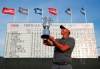 FILE - In this June 17, 2018, file photo, Brooks Koepka poses with the trophy after winning the U.S. Open Golf Championship, in Southampton, N.Y. Koepka has a chance to become only the second player, and first in more than a century of golf, to win three straight U.S. Open title. (AP Photo/Carolyn Kaster, File)