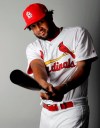 FILE - In this 2019 file photo St. Louis Cardinals' Jose Martinez poses at spring training in Jupiter, Fla. Martinez signed a $3.25 million, two-year contract to remain with the Cardinals. The outfielder/first baseman will be sending some the money to his family in Venezuela, a country plagued by food and medical shortages amid a political crisis. (AP Photo/Jeff Roberson, File)